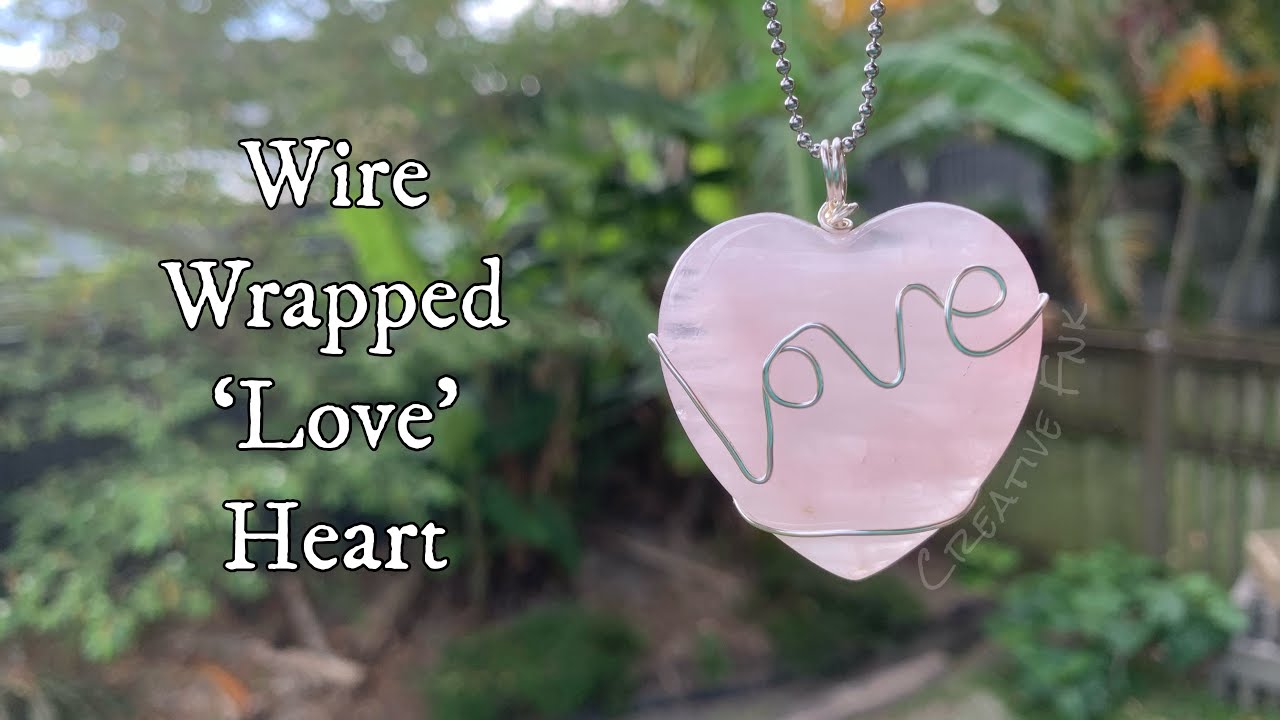 Wire wrapped ‘love’ heart. Heart shaped crystal pendant or hanger  💜