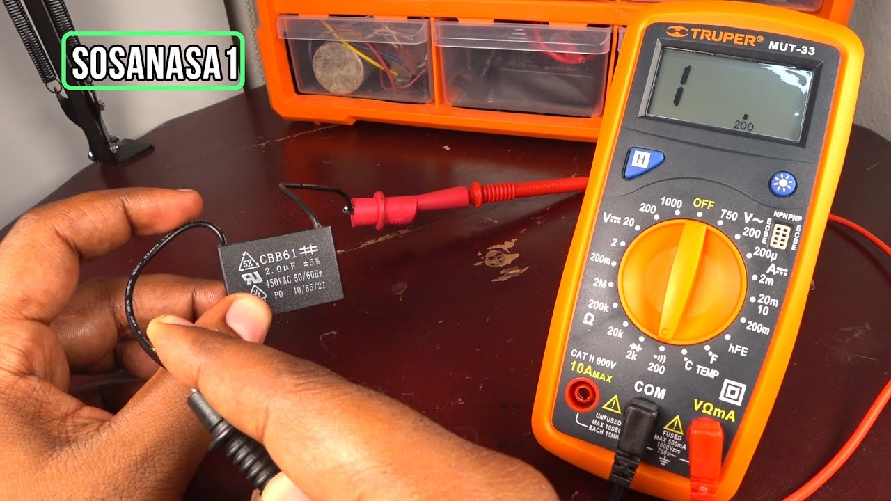 como probar si un capacitor / condensador de abanico o ventilador funciona con el multímetro mut 33