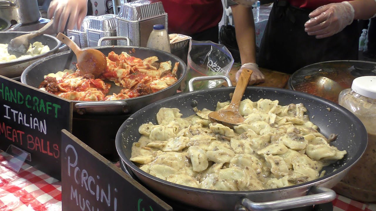 London Street Food. Italian Pasta, Meatballs, Mushrooms Tomato and Pesto Sauces Seen in Brick Lane