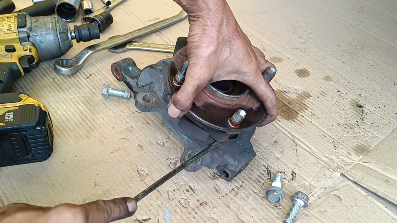 How to Replace Front Wheel Bearing Nissan Grand Livina #automobile #car
