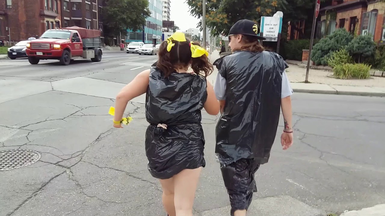 SHOPPING DRESSED UP IN GARBAGE BAGS