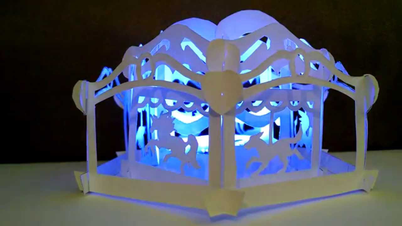 Paper Carousel prototype with rainbow moving lights