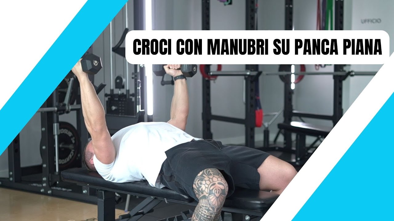 CROCI CON MANUBRI SU PANCA PIANA