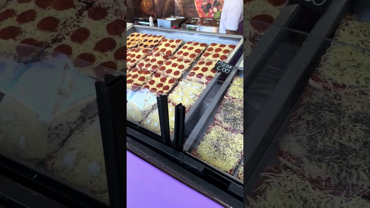 Food market stall full of pizzas in Mallorca #pizza #pizzalover #foodies