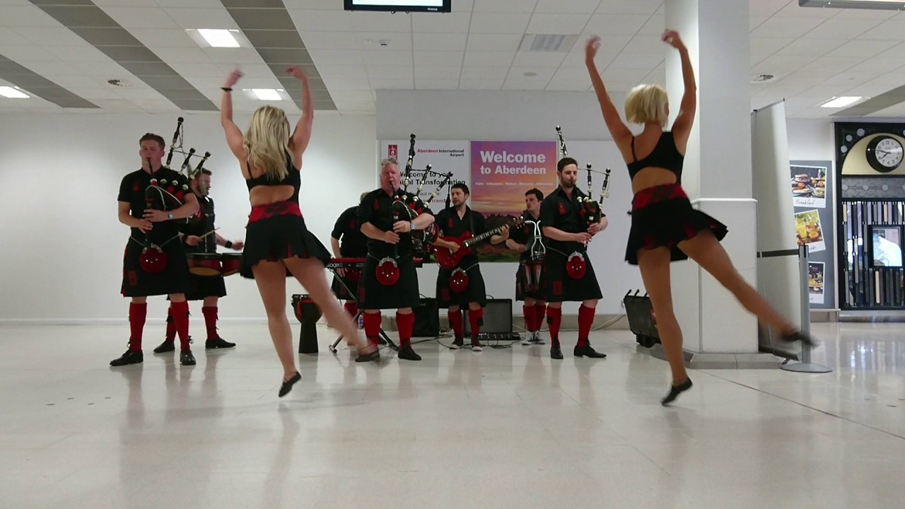 Red Hot Chilli Pipers at Aberdeen Airport.