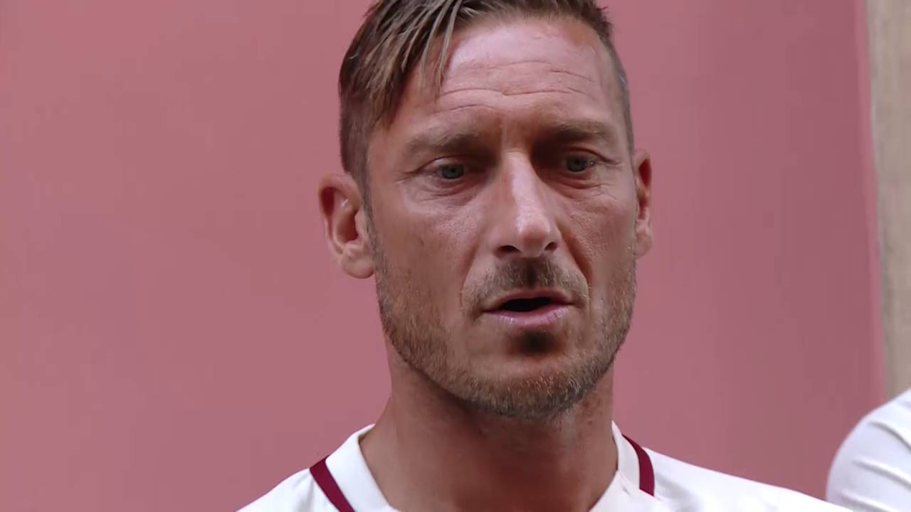 Roma captain Francesco Totti and teammates unveil the new 2016-17 away kit