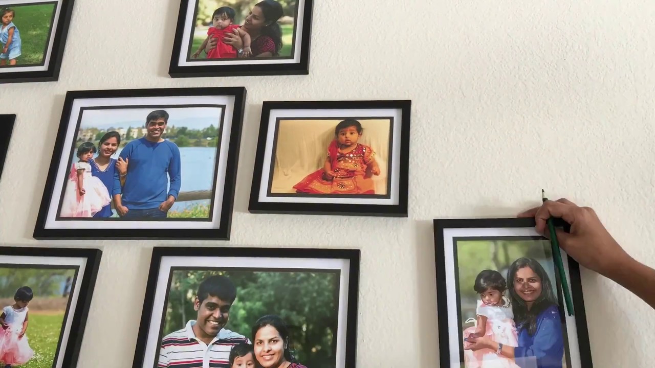 How to create a gallery wall using dollar store photo frames | Room decor DIY