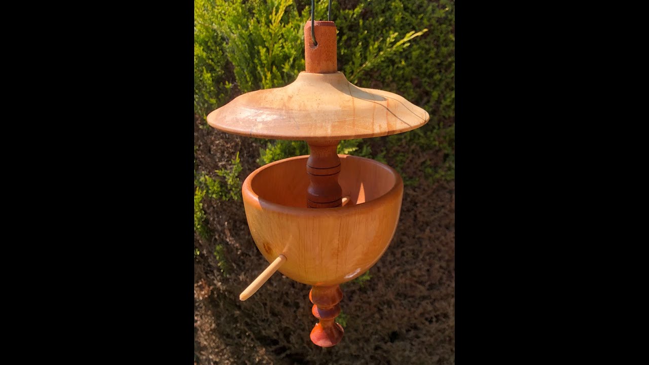 Turning a bird feeder on the lathe.