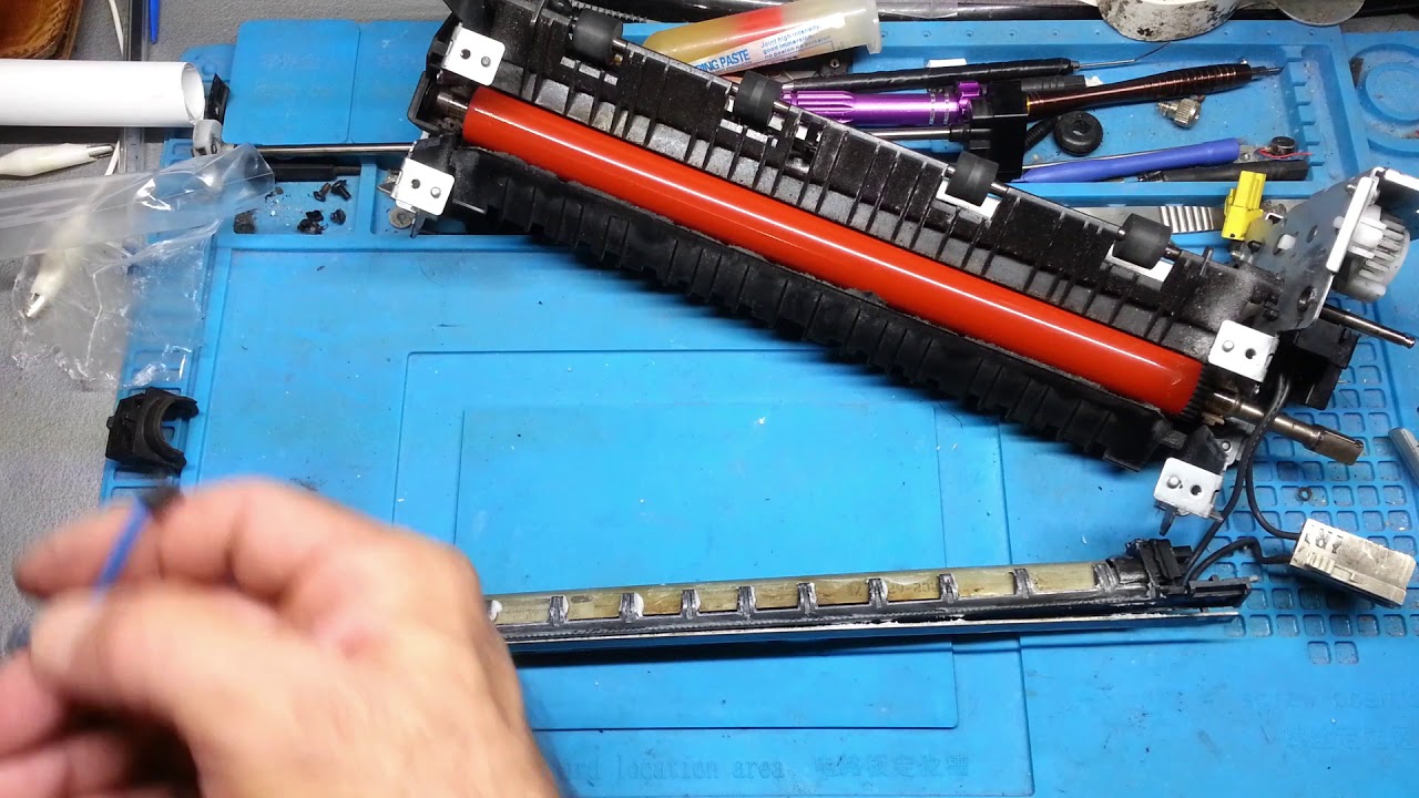 Se atoran las hojas | Cambio Teflón Fusor HP 2055DN