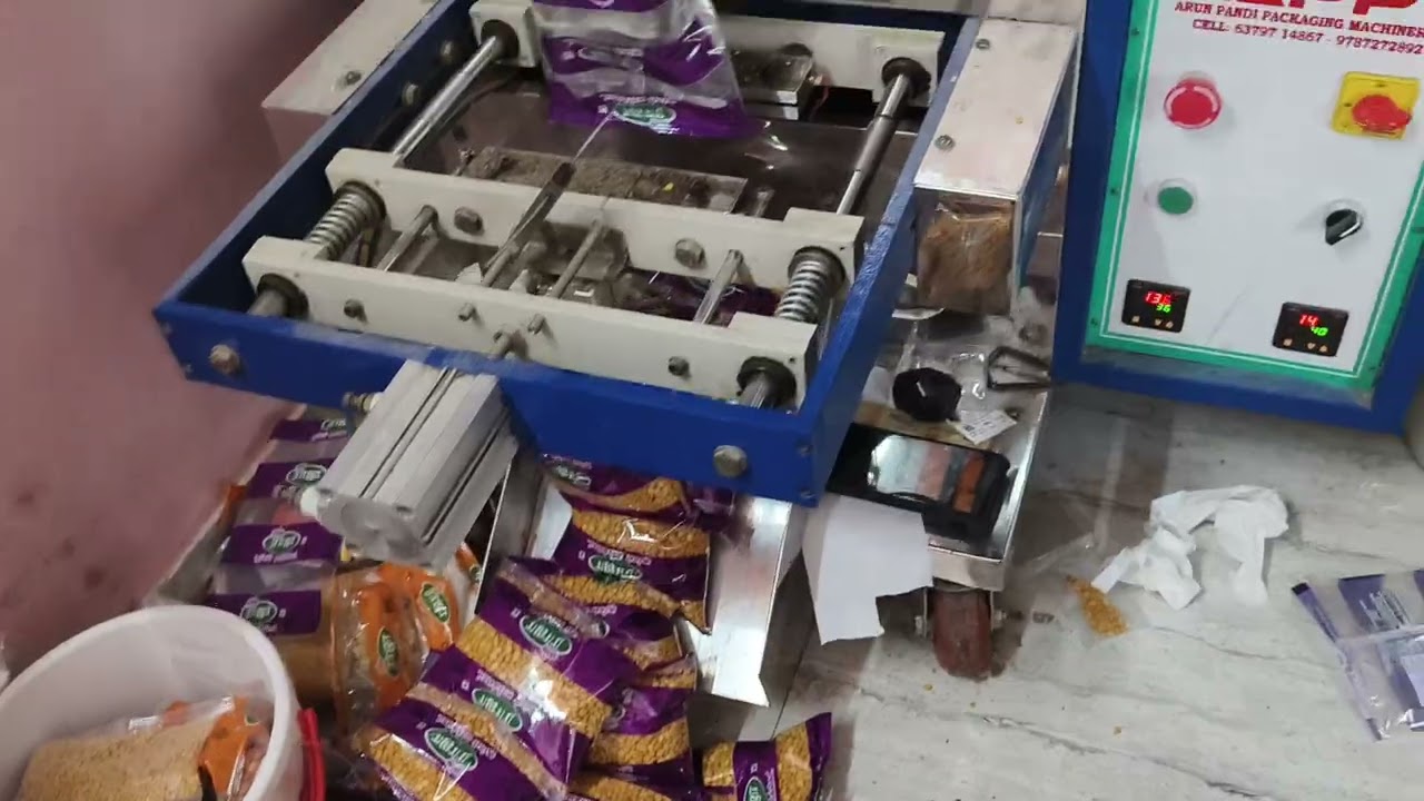 Arun pandi packaging Machineries contact 6379714867-9787272892 double head machine 5Gms to1kg 2year 