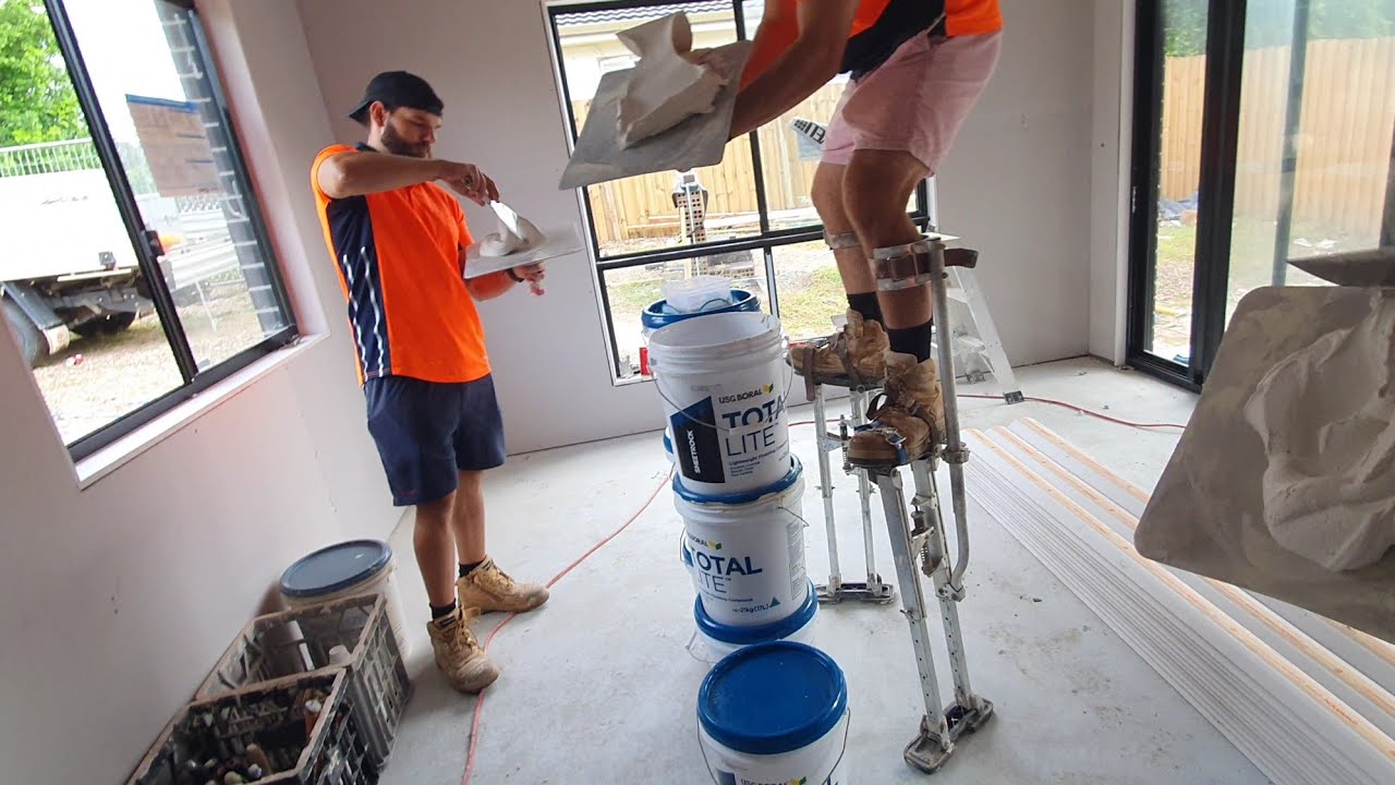 Pro Drywall Construction Crew Finishing New House Build