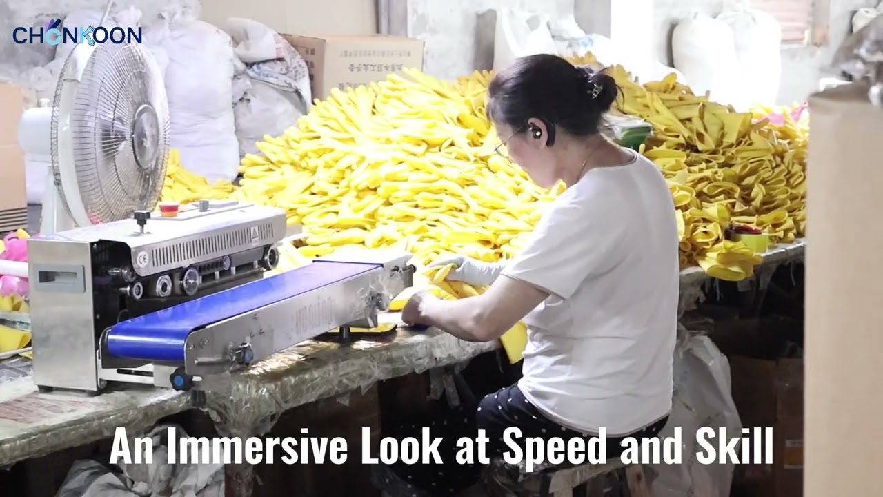 ⚡ Our workers’ speed and skill make packaging these yellow latex gloves look effortless.