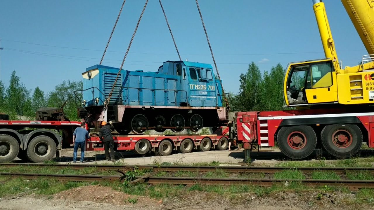 Погрузка тепловоза ТГМ 23 немецким автокраном на трал! 45 тонн против 130 тонн!
