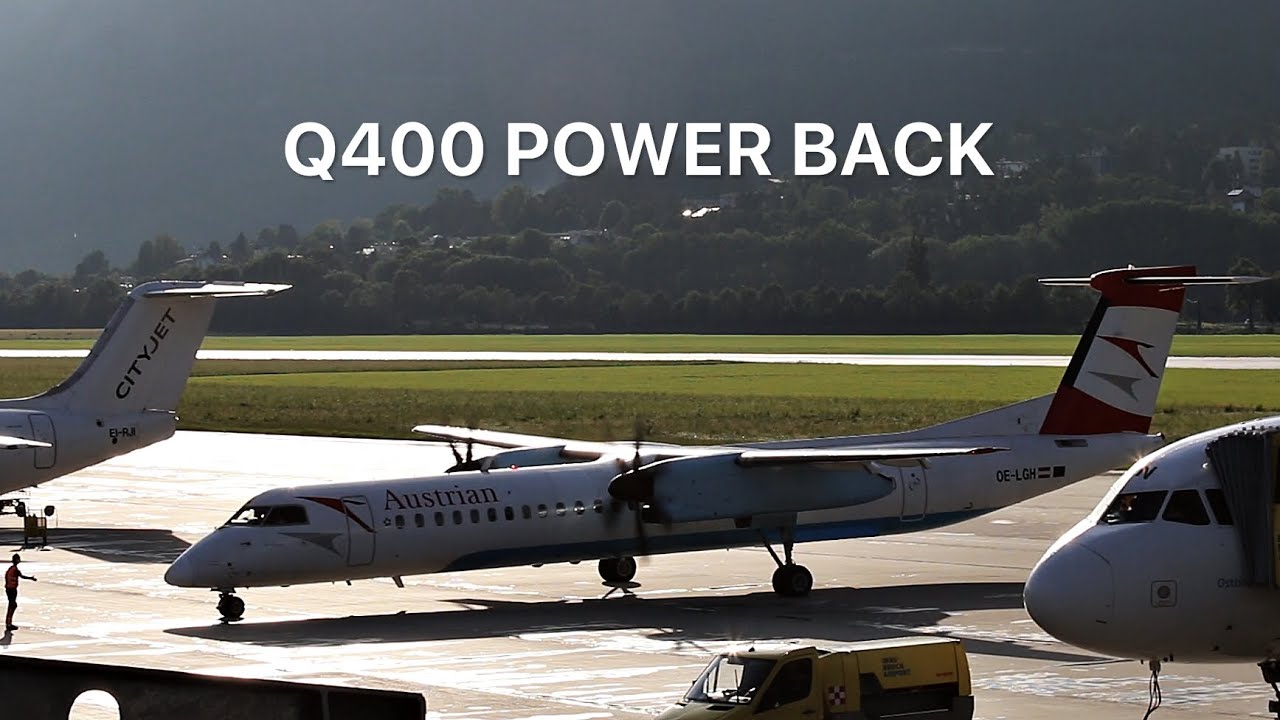 Q400 POWER BACK & ENGINE VORTEX DURING DEPARTURE AT INNSBRUCK