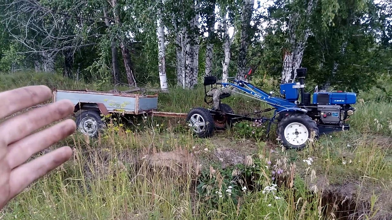 В карьер за песком с автомобильным прицепом.