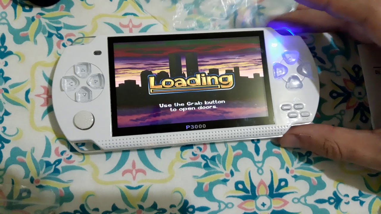 Vídeo game portatil que roda ps1, super Nintendo e muitos outros, o P3000