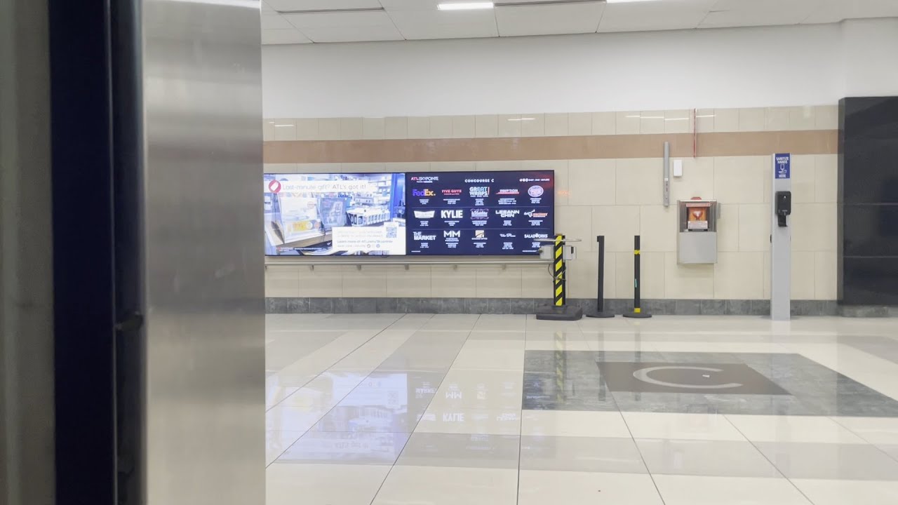 Ride on the Atlanta Airport Plane Train from Concourse C to Domestic Terminal