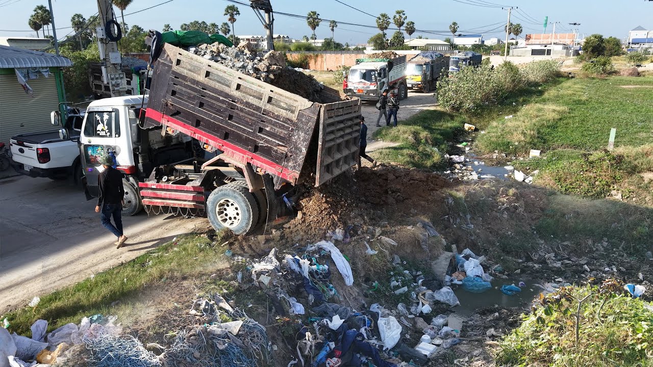 GREAT Job! Excellent KOMATSU Bulldozer Push Stone Building New Road With Dump Trucks Processing