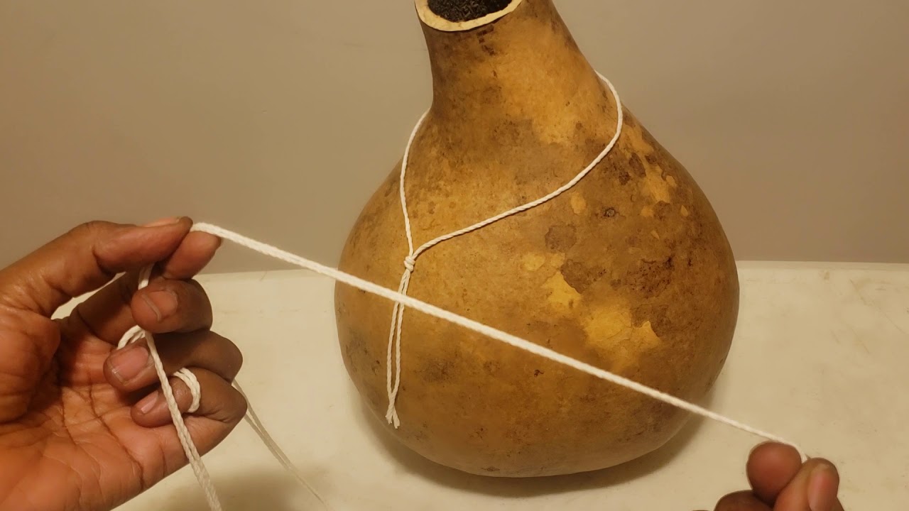 Sekere making (collar and master strings) with Iya Makeda