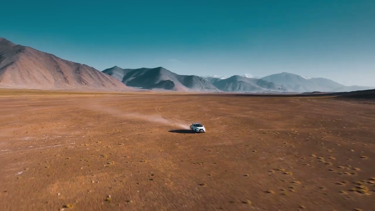 Car In A Desert Drone View - Stock Video