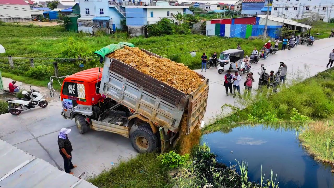 Start New Project Landfill Flooded !! Bulldozer KomatSu D31P Push soil ,Truck 5Ton Unloading Rock