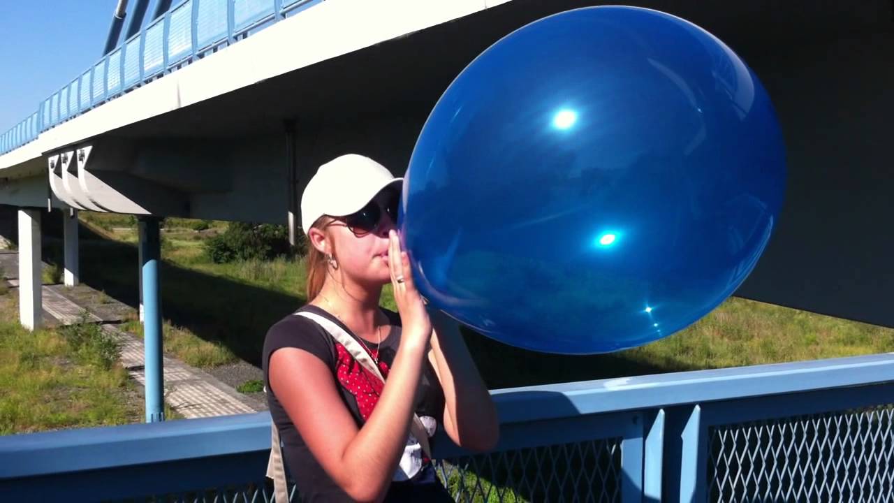 19  Really big blow to pop of  a blue transaprent balloon   very nice