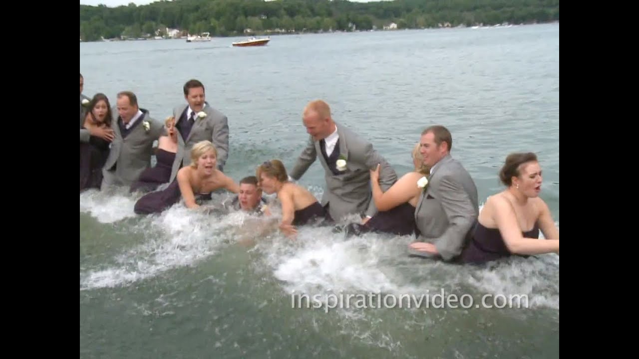 Caught on tape: Wedding party falls into lake