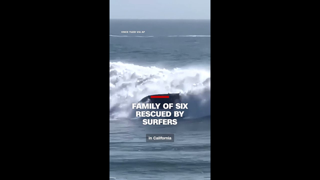 Surfers rescue family of six after boat capsizes