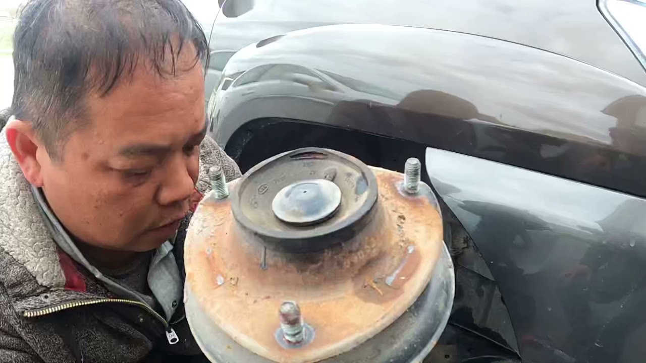 2005 Kia Sportage front strut replacement step by step