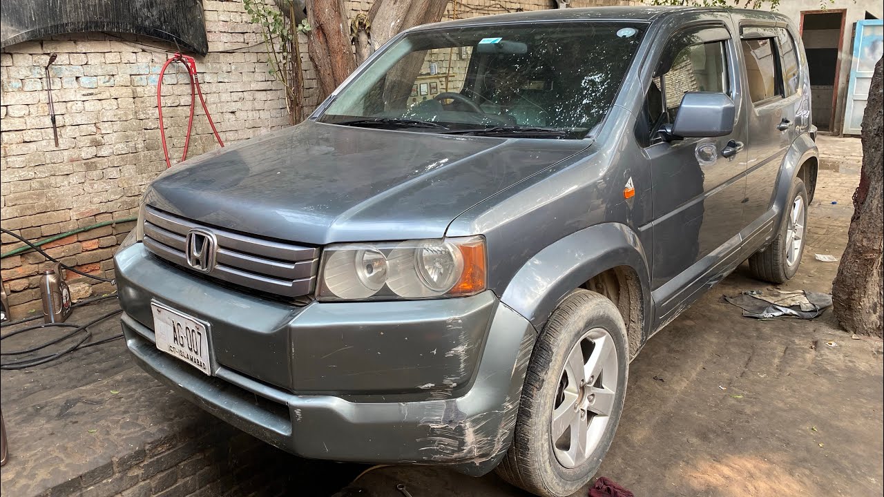 Honda crossroad oil filter ac filter and engine oil change 