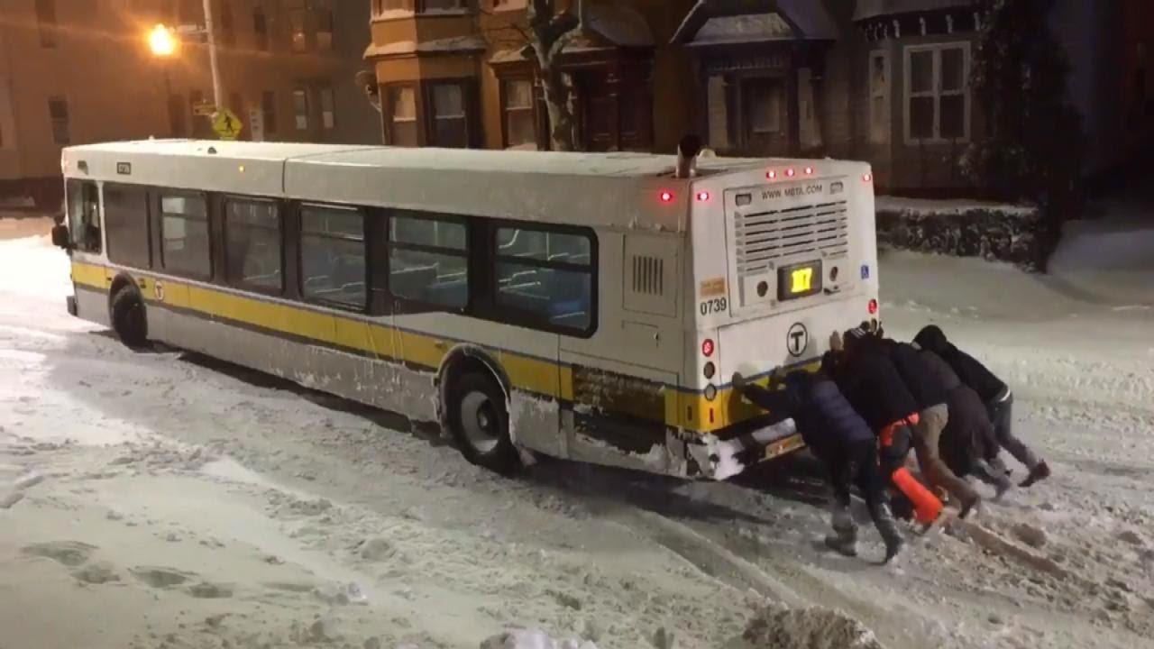 Strangers Come to Rescue of Bus Stuck on Icy Street