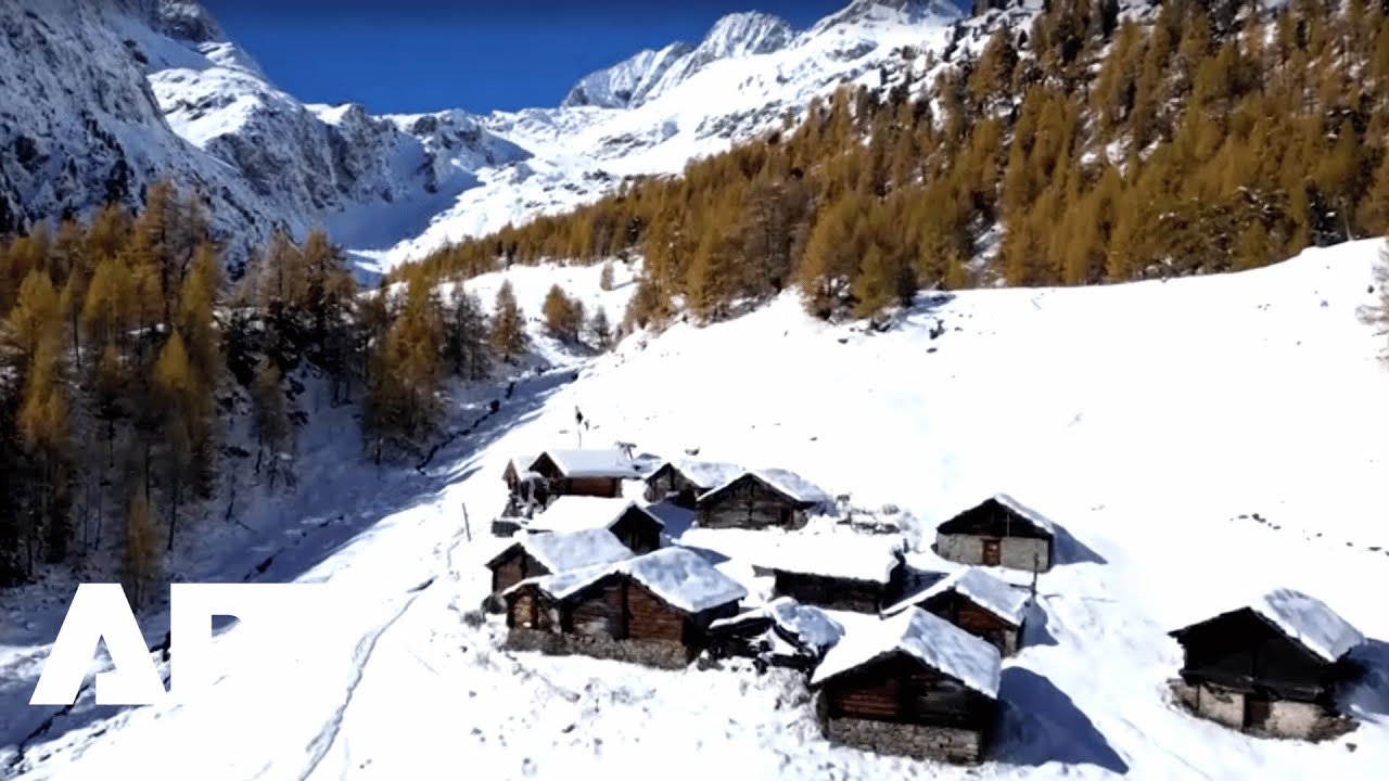 Golden Autumn Meets First Snowfall in Switzerland&rsquo;s Arolla Village | APT