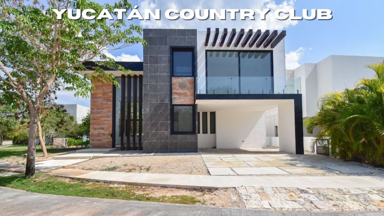 ¡Casa en venta en el YUCATÁN COUNTRY CLUB! Cocina equipada y doble altura en sala ¡Te va a encantar!
