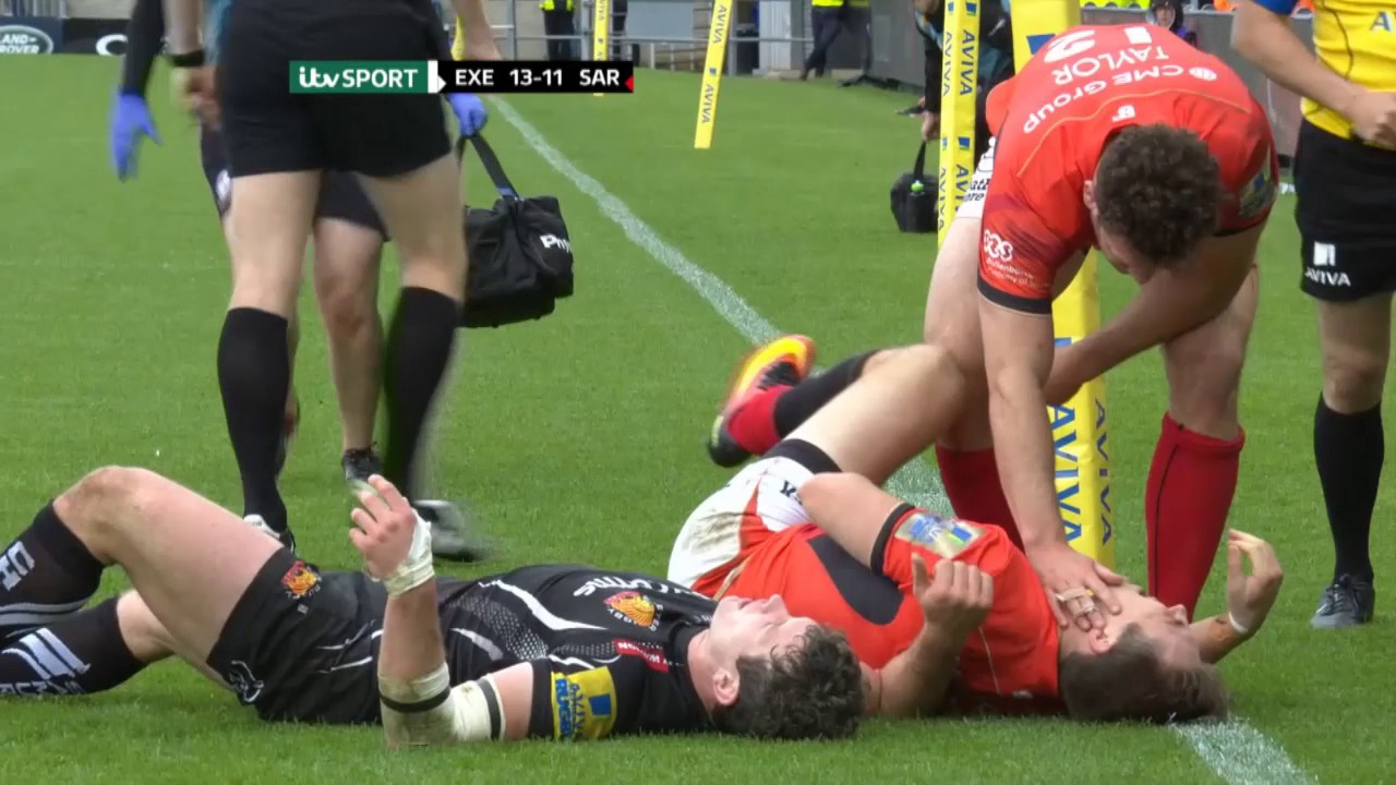Saracen's Chris Wyles gets hit hard while scoring try