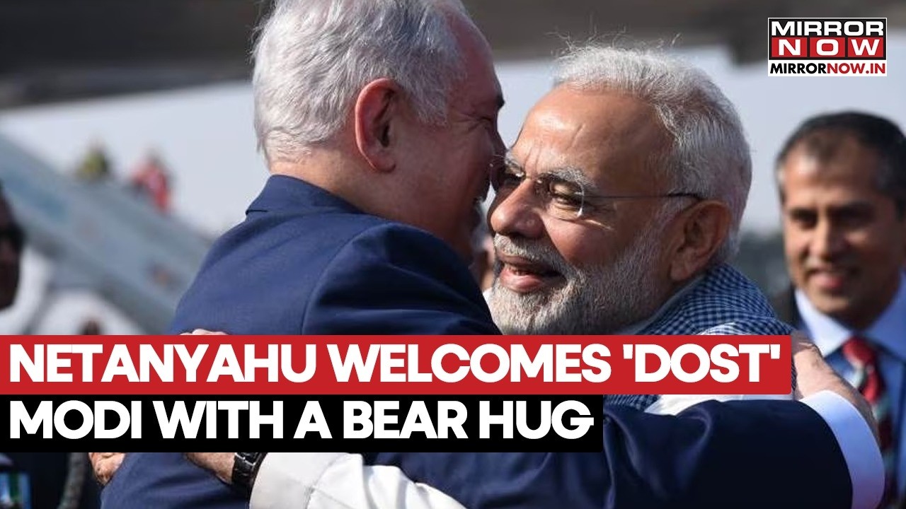 Israeli PM Netanyahu Welcomes 'Dost' PM Modi At Ben Gurion Airport With A Bear Hug & Handshake