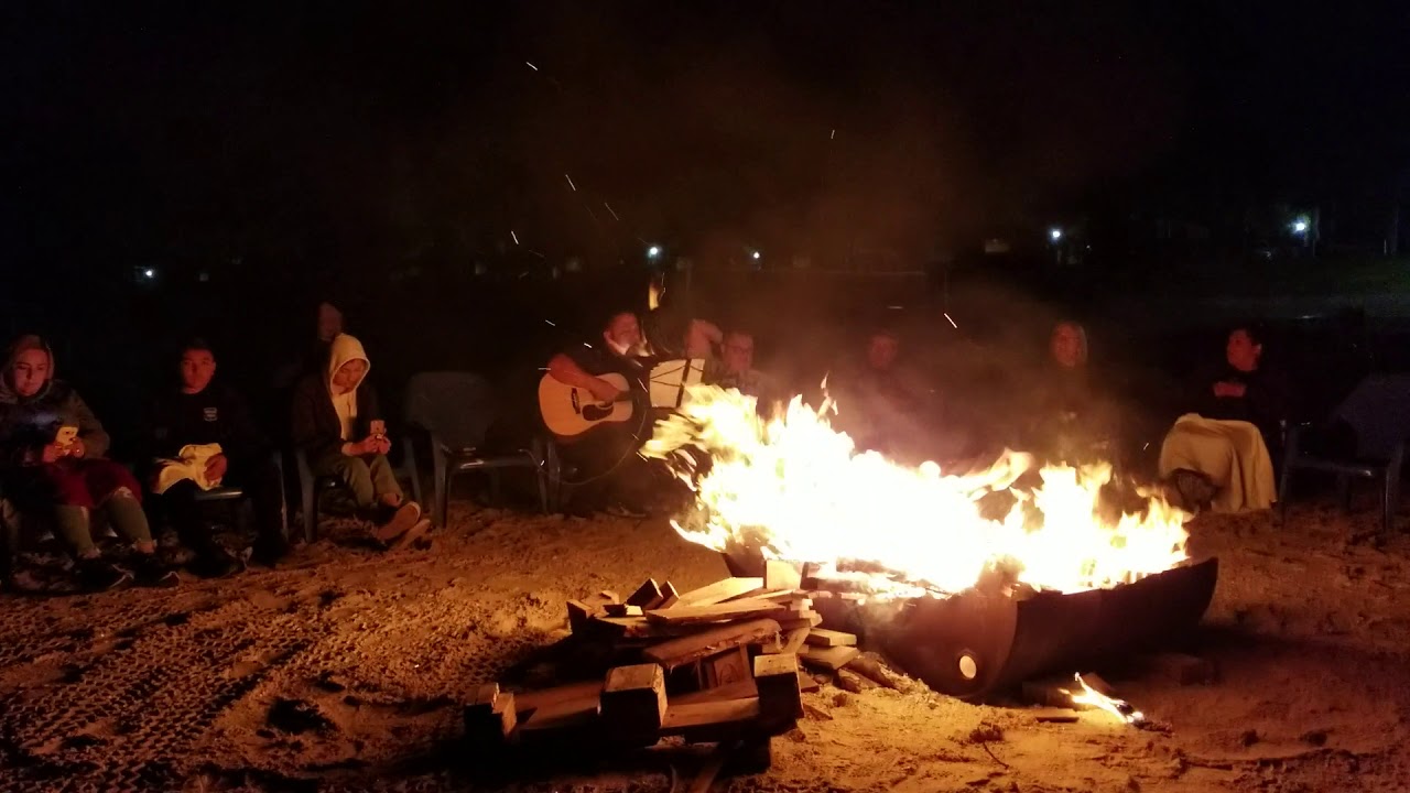 Worship on a bonfire in the sea Galilee CCITL trip to Israe 2019