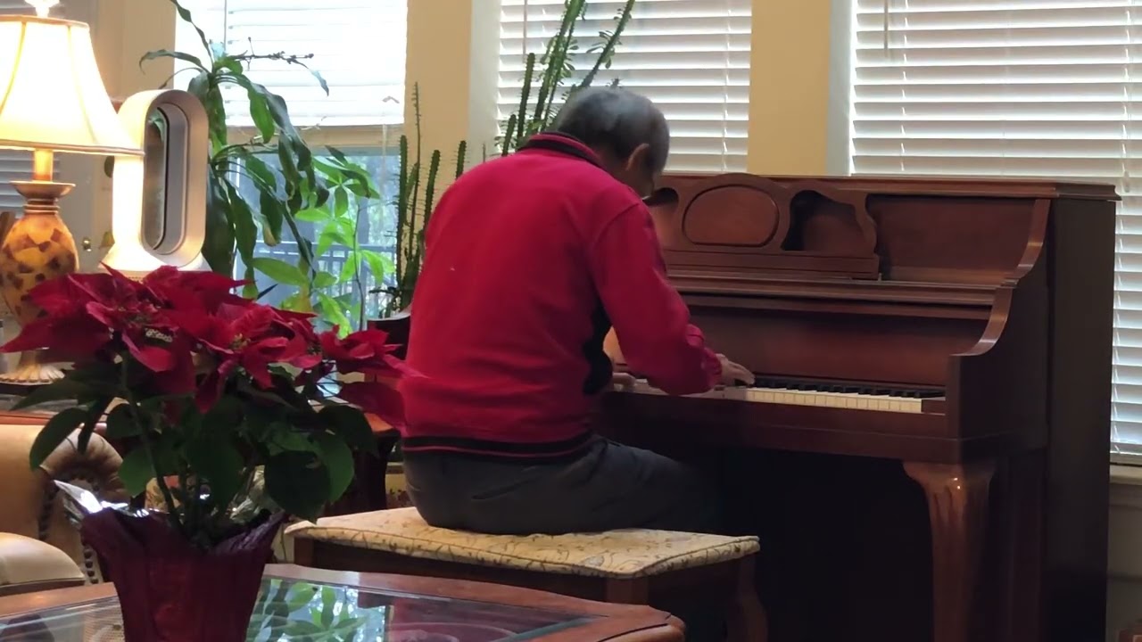 Playing piano Greensleeves