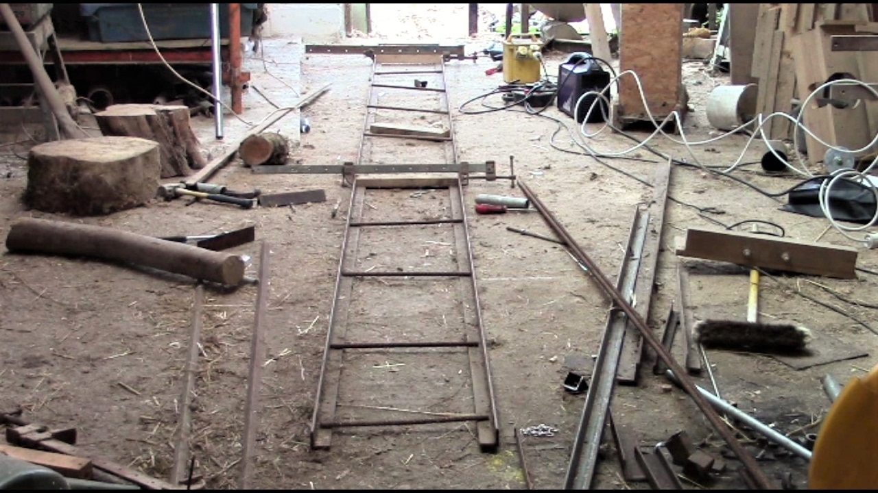 Laying Down Narrow Gauge Railway Tracks In The Workshop.