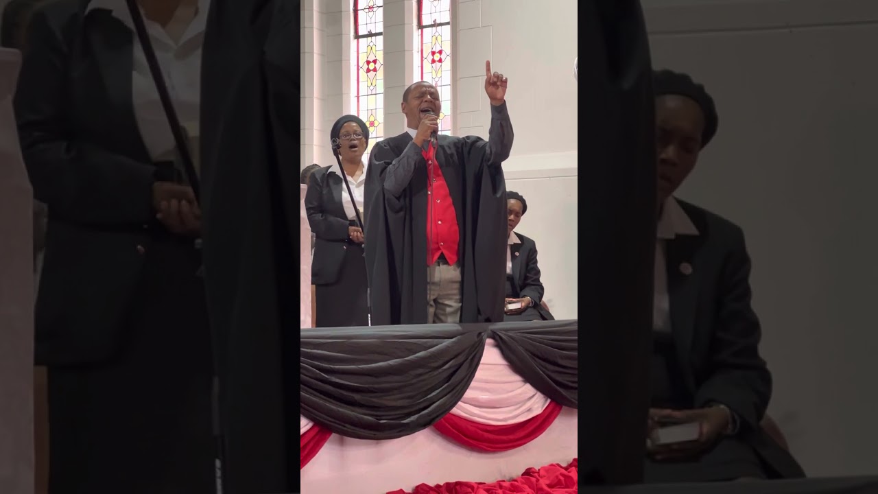 Rev Mantini worshiping