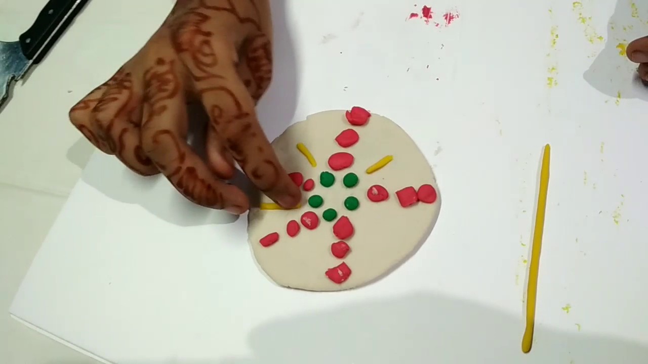 Reda making pizza with play doh