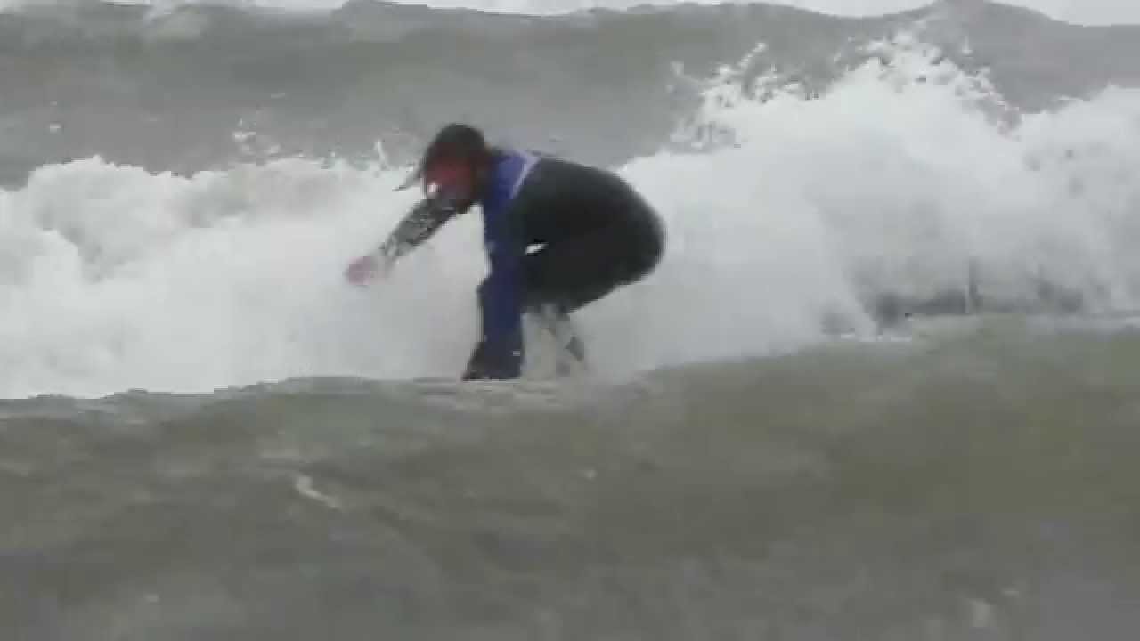 Surfing at Langland Bay, Gower Peninsula, Wales