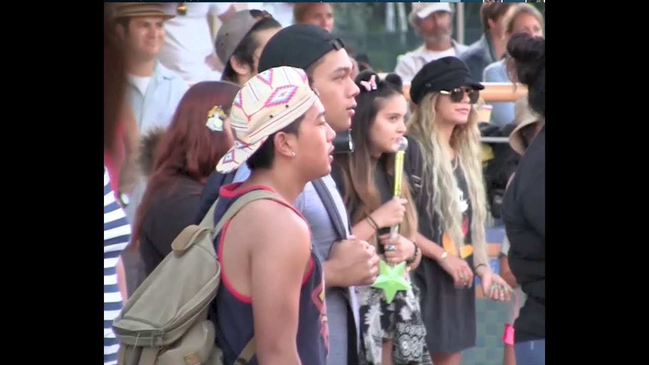 Vanessa Hudgens dances her butt off with her family at Disneyland in Anaheim, CA