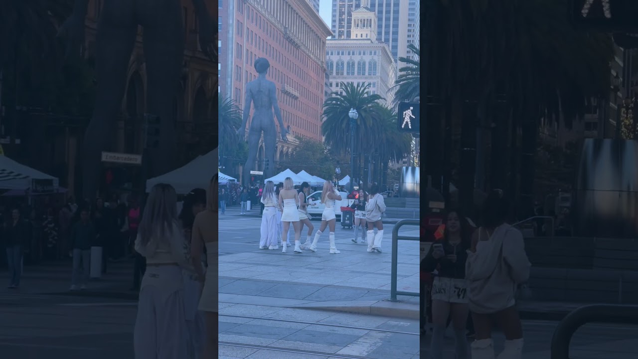 Dancing in front of Ferry building and R evolution statue.