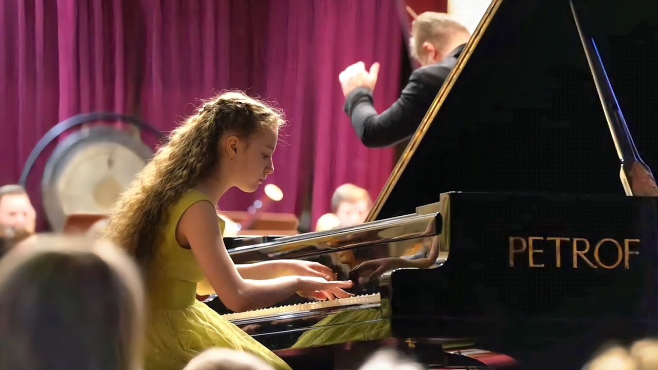 Nora (13) plays Edvard Grieg - Piano Concerto in A minor, Op. 16 - I. Allegro molto moderato