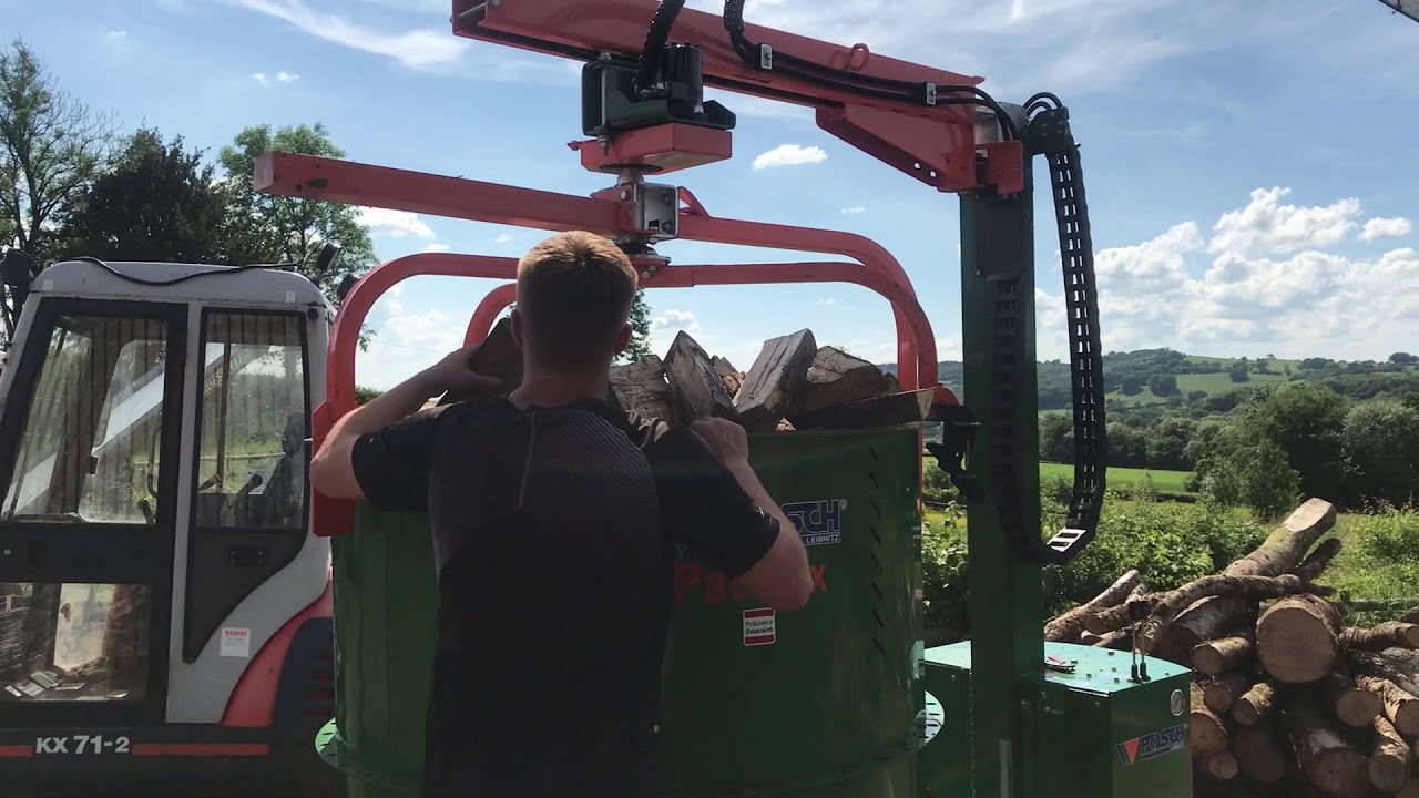 Dyfed Firewood Log cleaner and packfix operation