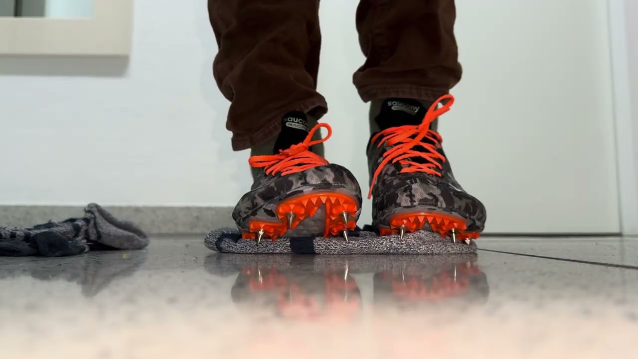 ASMR ripping apart toe socks of a fan with Saucony Track spikes 