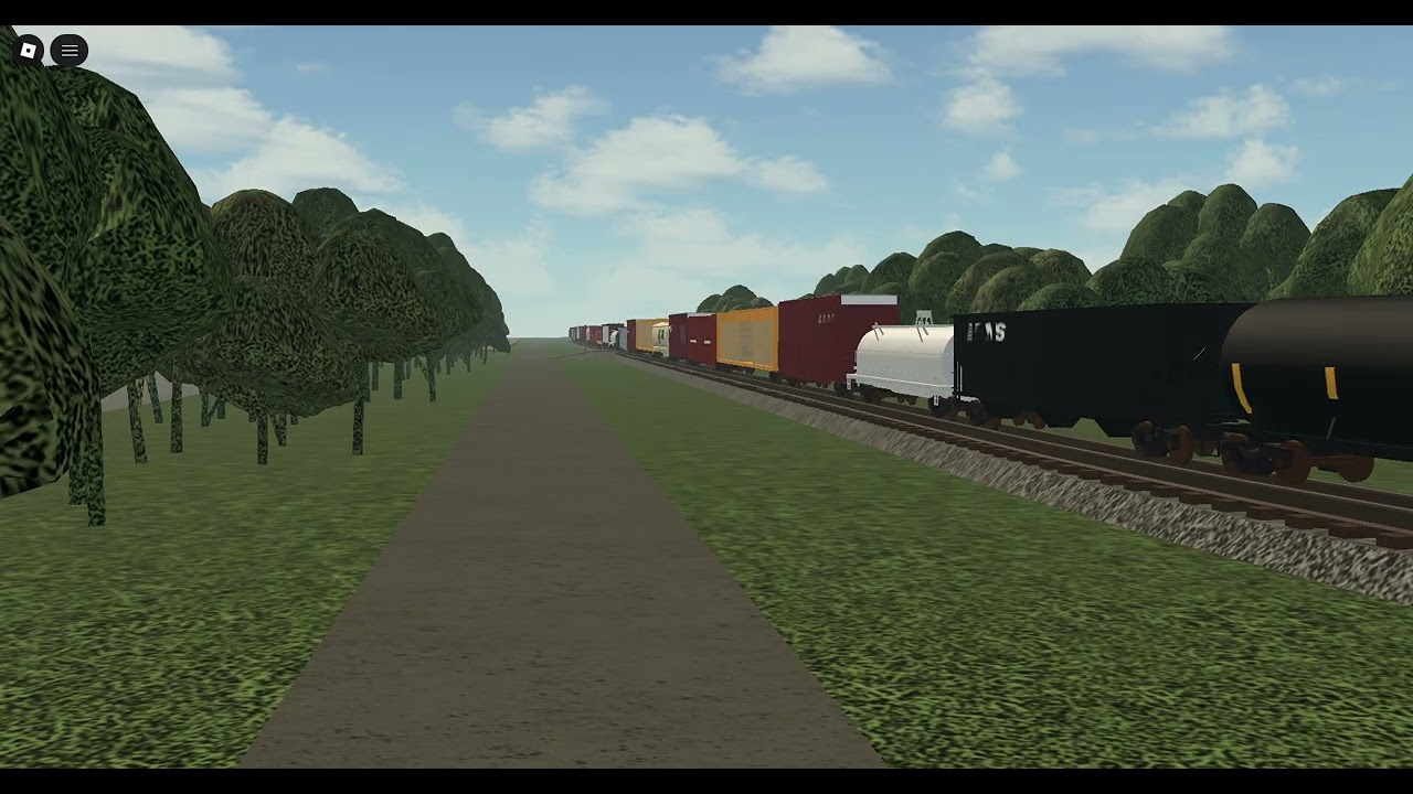 Norfolk Southern 4473 slows down for the curve.