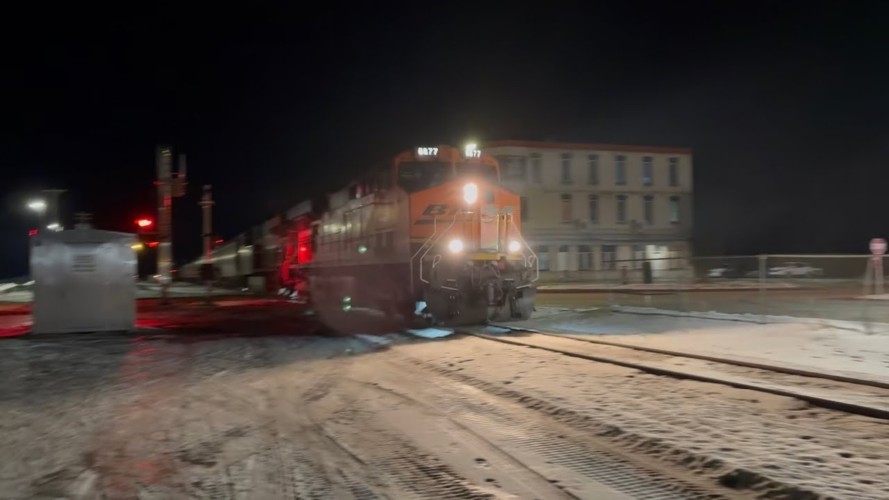 BNSF #5877 leads this 2x0 empty grain. Brainerd Sub