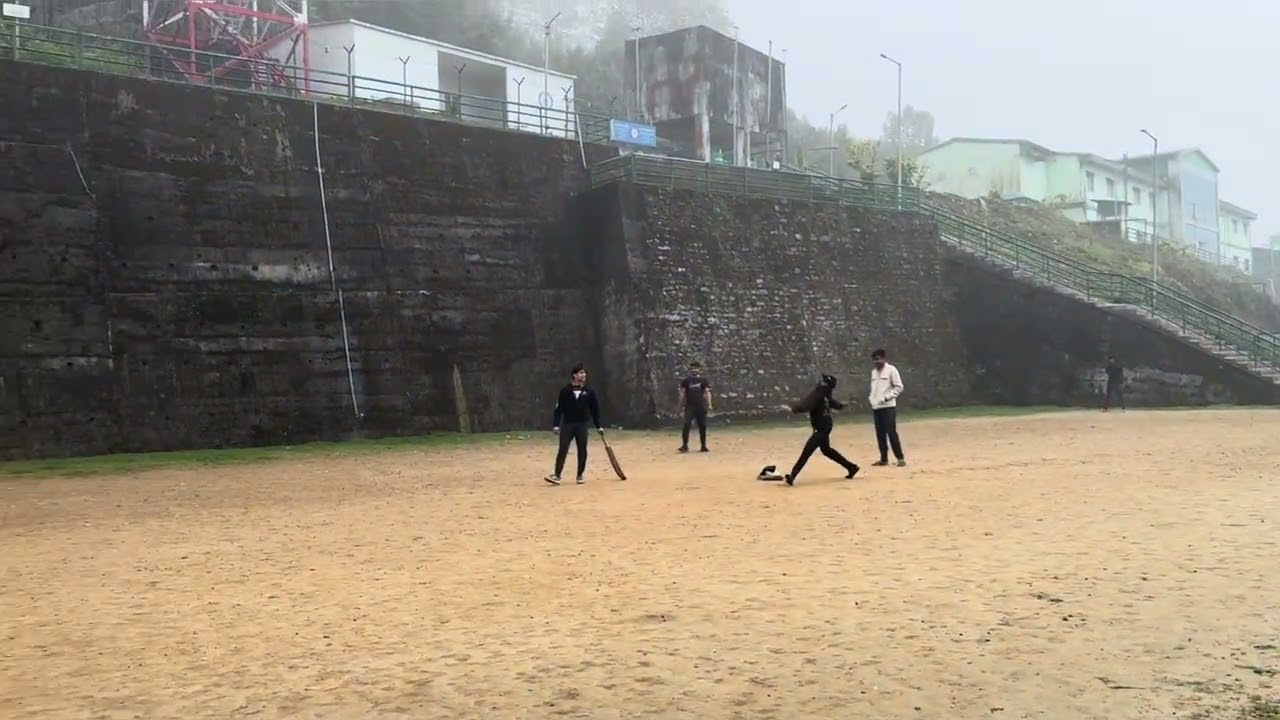 Cricket in rainy season at college ground.  