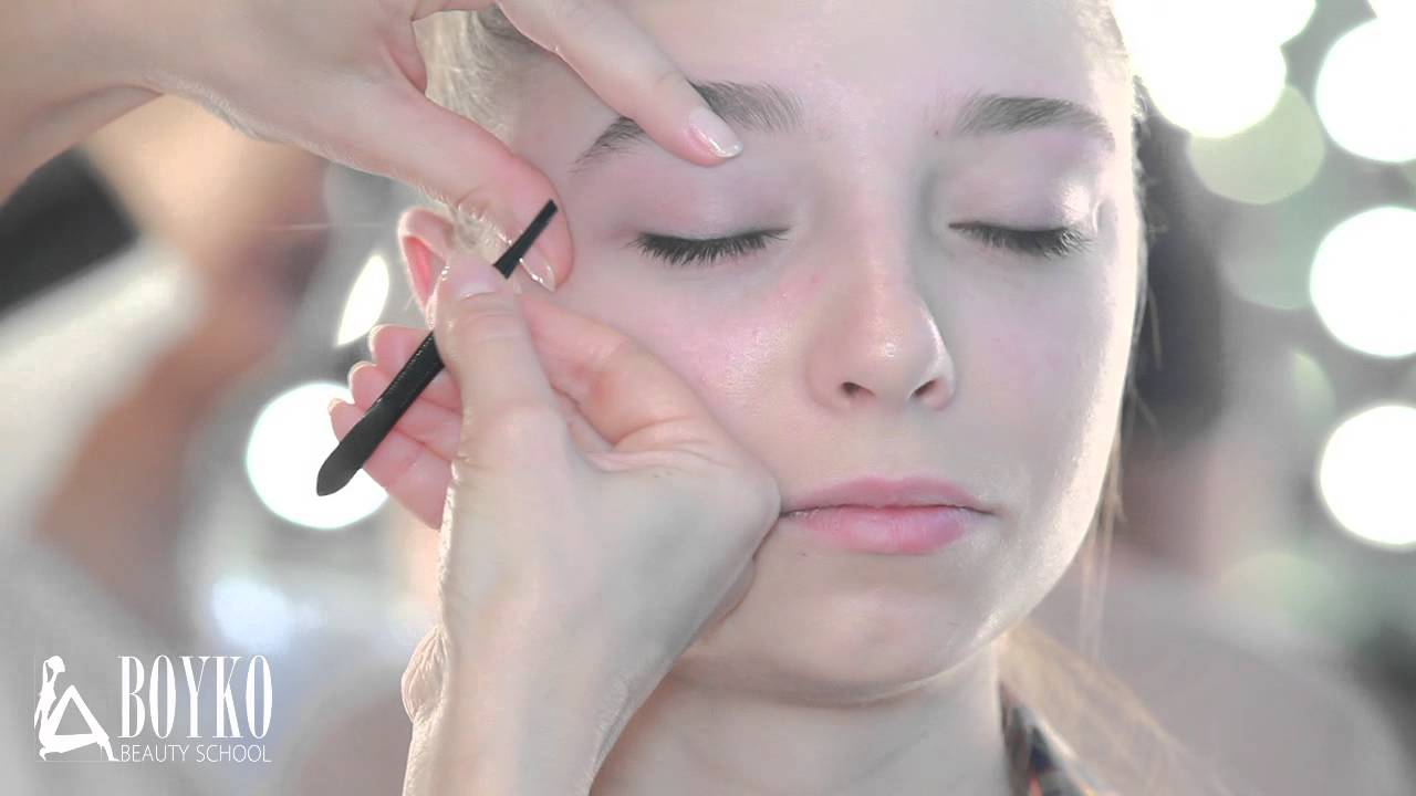 Proper brow shaping. Coloring of eyebrows and eyelashes